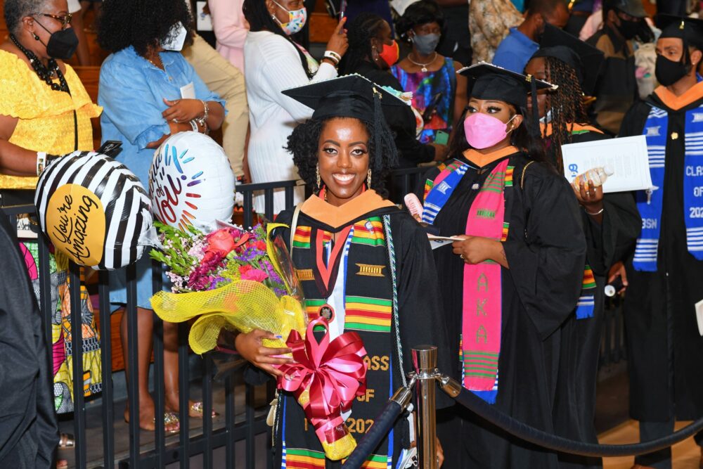 Destiny Smalls poses at Commencement 2022