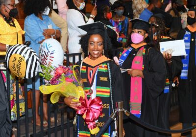 Destiny Smalls poses at Commencement 2022